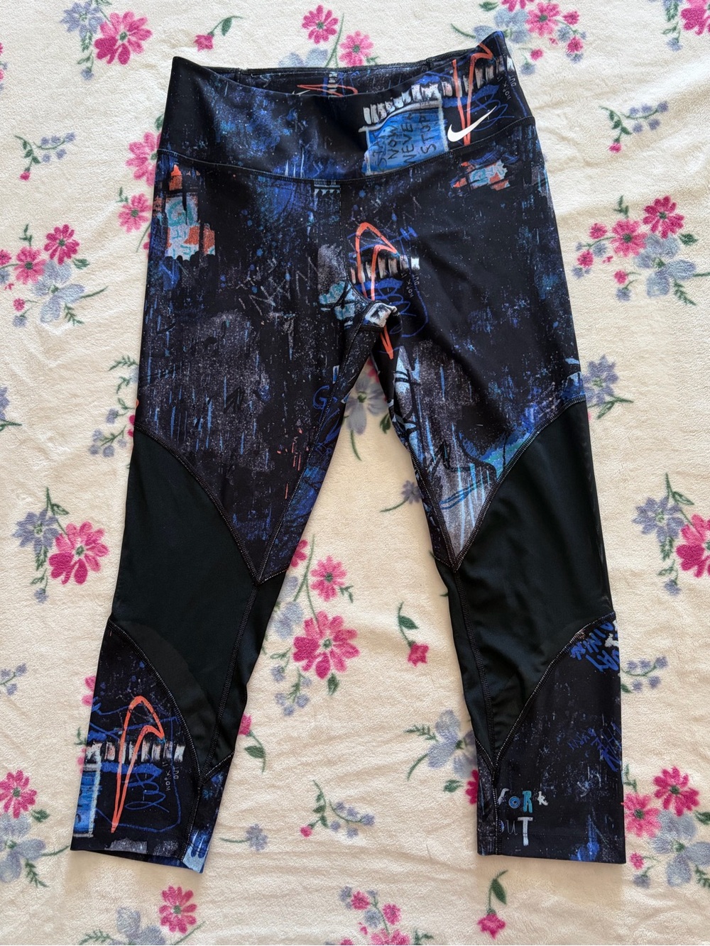 Nike Black Capri Leggings with Blue and Orange Graphics